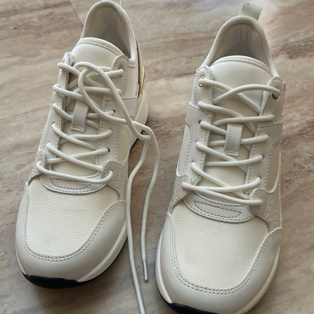 NWOT White wedge sneakers.  Never worn in size 5.